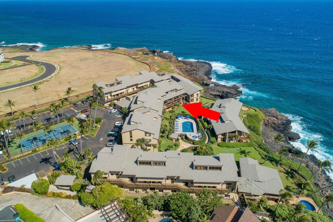 1661 Pee Road, Unit IIA101 Koloa, HI 96756 - Photo 27 of 28 an aerial view of residential houses with outdoor space