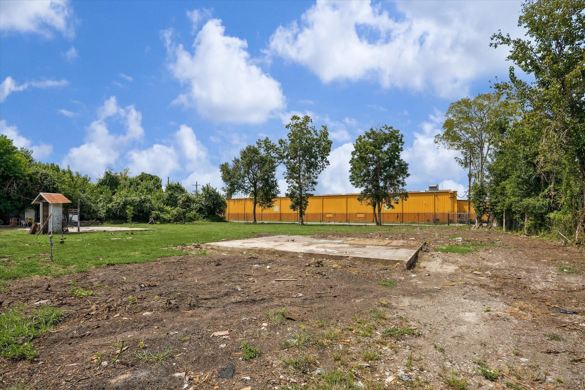 8402 Bondale Street Houston, TX 77040 - Photo 9 of 11 a view of a yard with swings and slides