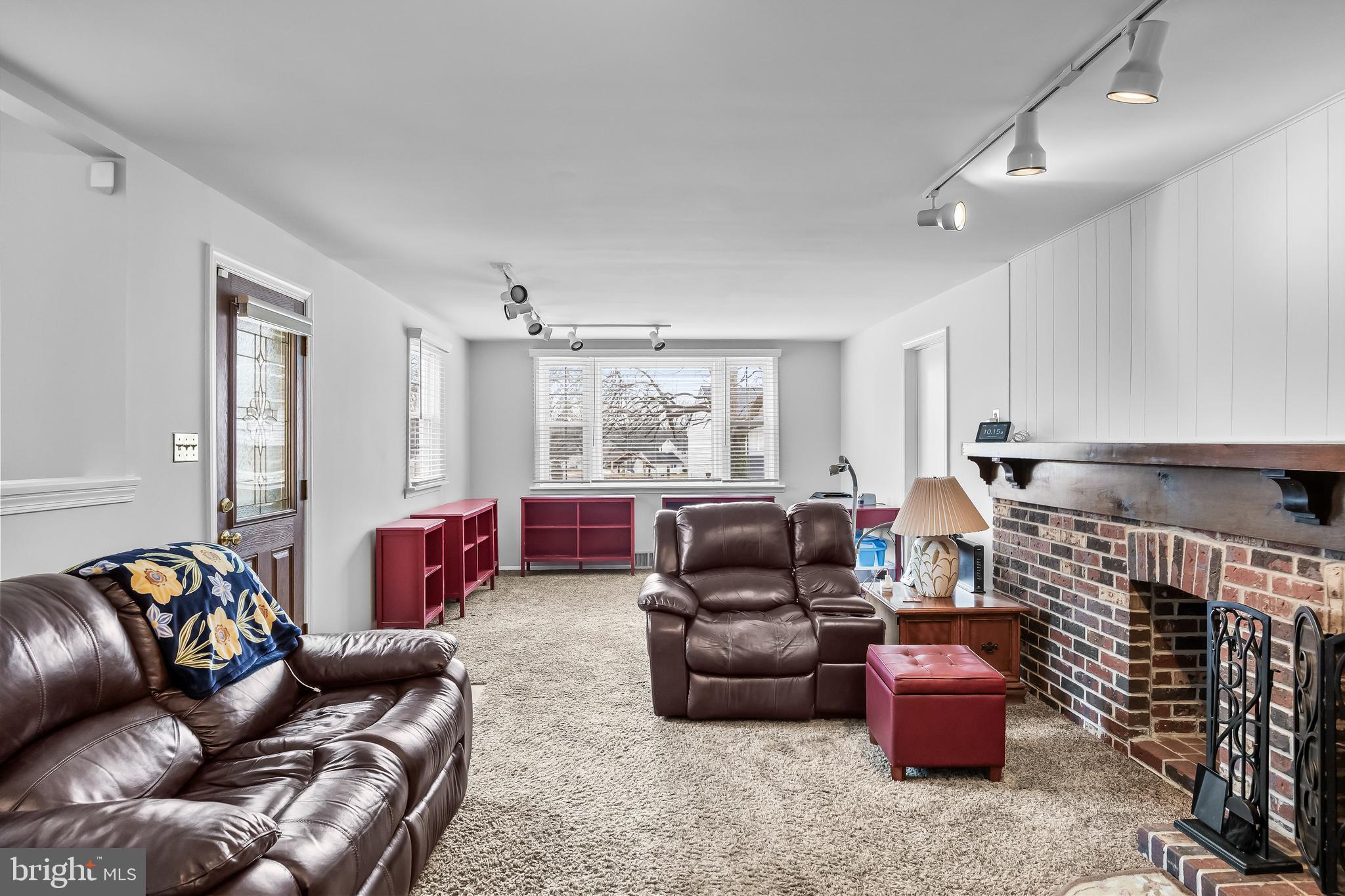 207 Farmington Road Delran, NJ 08075 - Photo 16 of 30 a living room with furniture a rug and a window