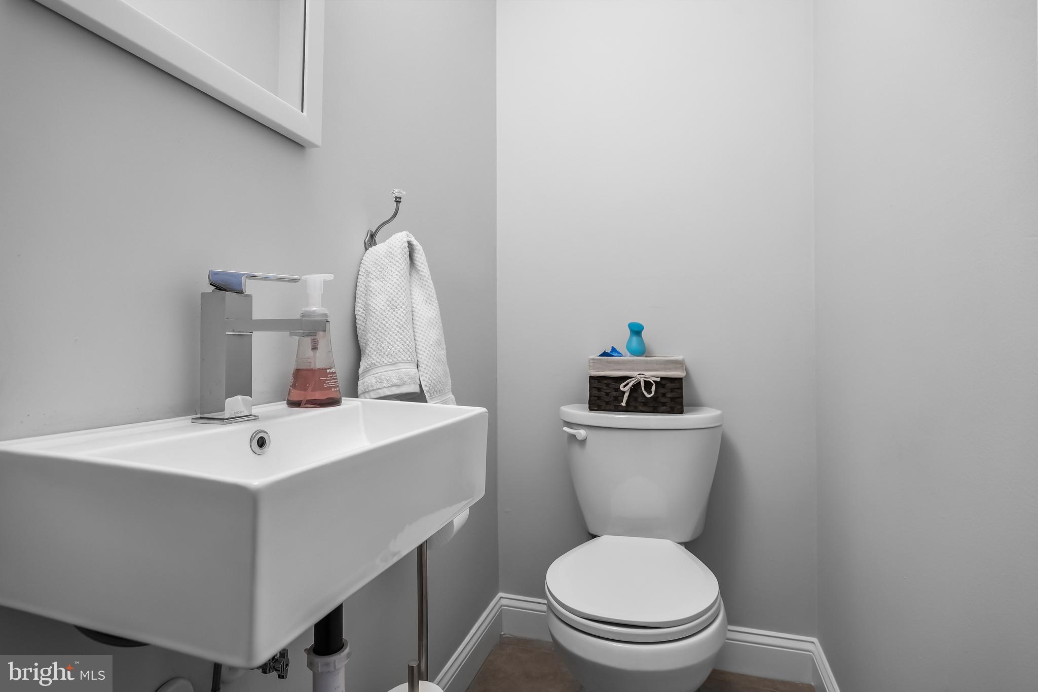 207 Farmington Road Delran, NJ 08075 - Photo 19 of 30 a bathroom with a toilet a sink and a mirror