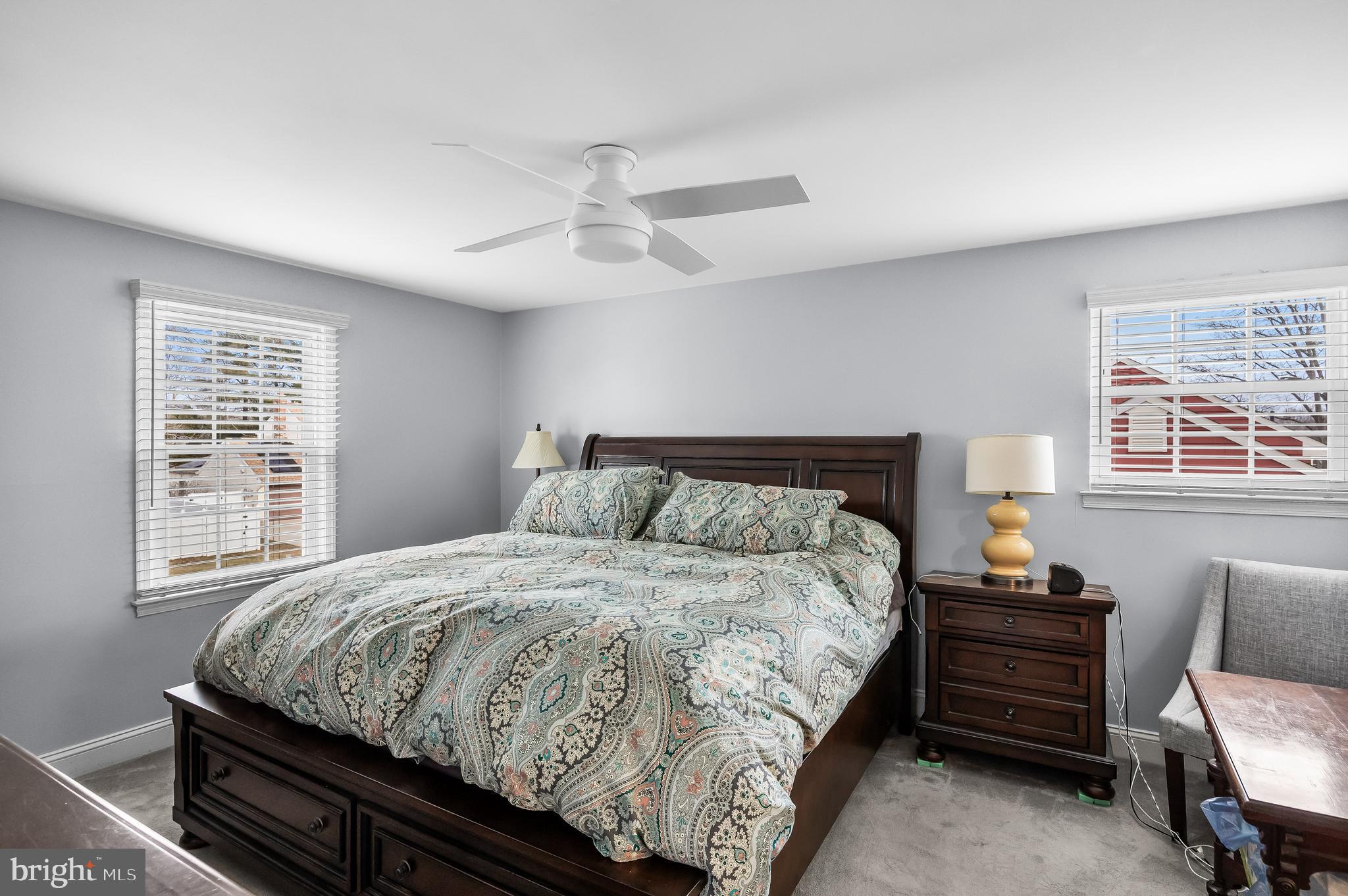 207 Farmington Road Delran, NJ 08075 - Photo 21 of 30 a bedroom with a bed and wooden floor