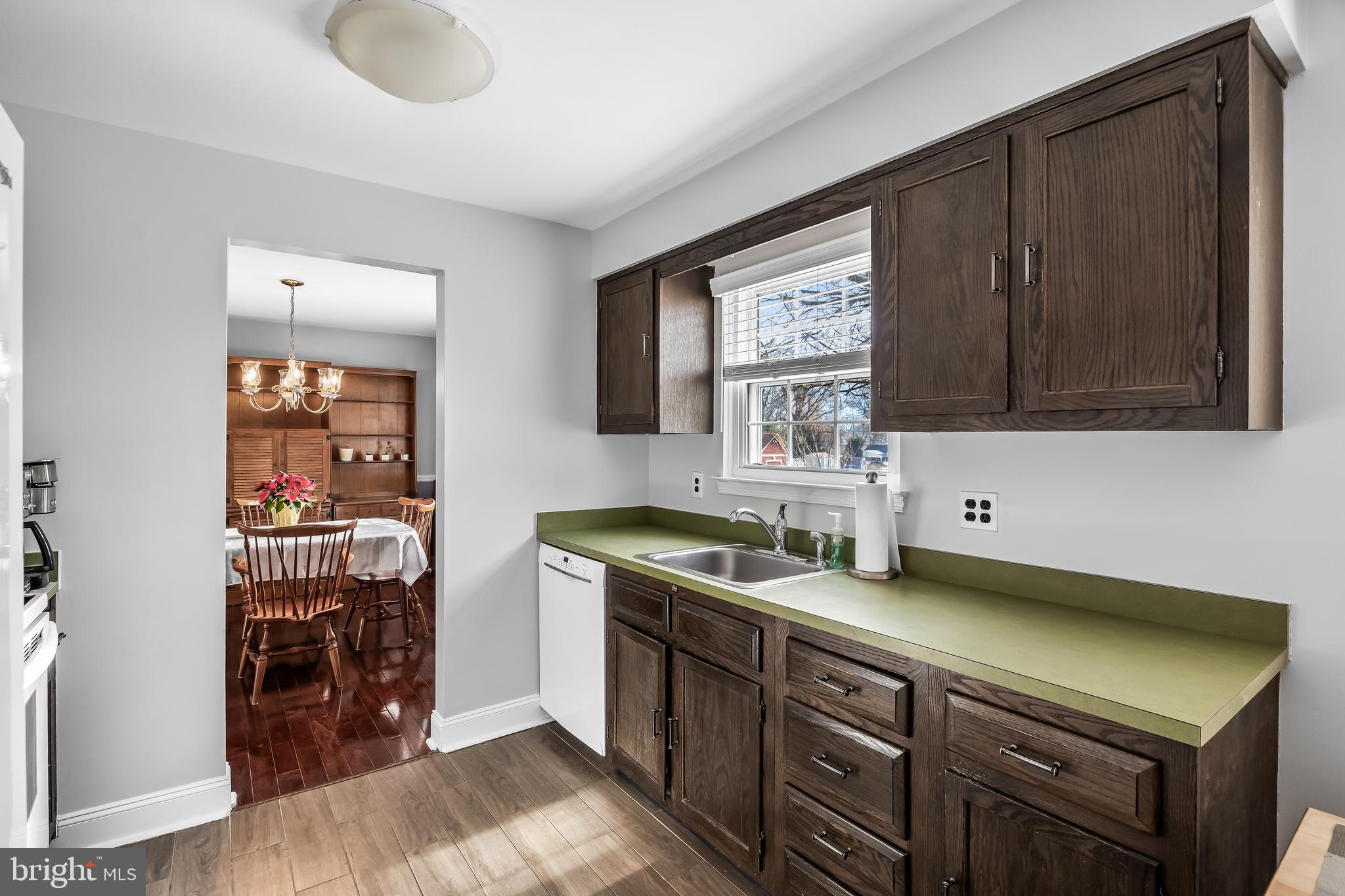 207 Farmington Road Delran, NJ 08075 - Photo 10 of 30 a kitchen with stainless steel appliances granite countertop a sink stove and cabinets