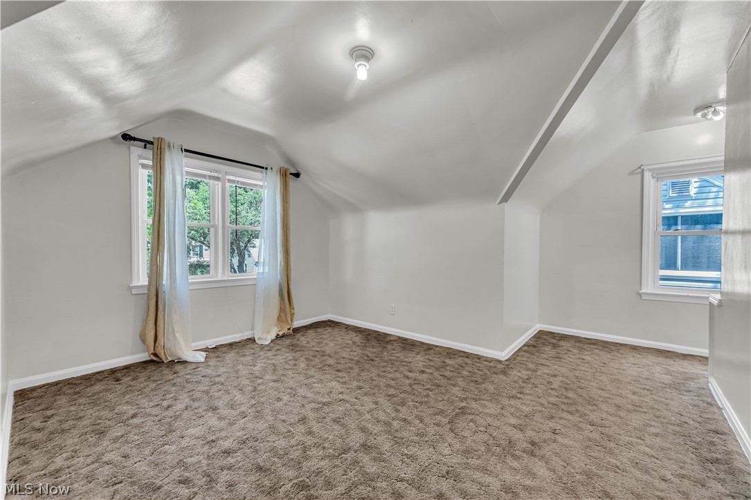 3842 Wallingford Road South Euclid, OH 44121 - Photo 24 of 31 Additional living space featuring carpet flooring and lofted ceiling