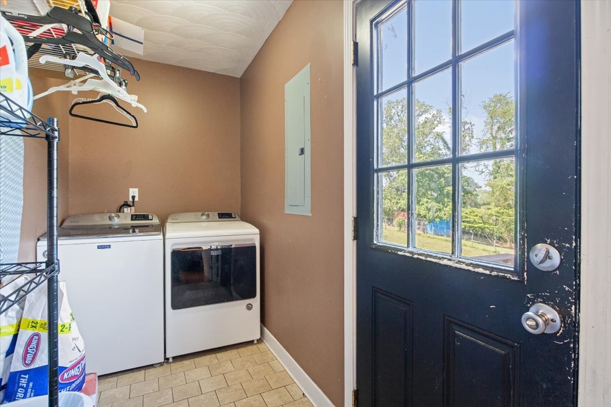 109 Bessie Clark Road Erin, TN 37061 - Photo 14 of 43 a view of washer and dryer