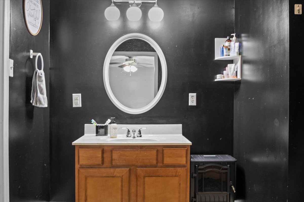 109 Bessie Clark Road Erin, TN 37061 - Photo 21 of 43 a bathroom with a sink and a mirror