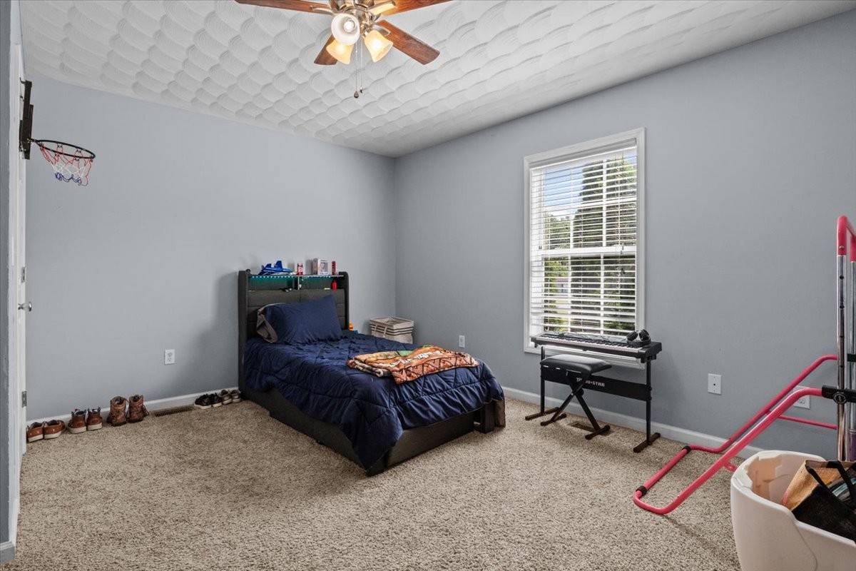 109 Bessie Clark Road Erin, TN 37061 - Photo 23 of 43 a bedroom with bed and a window