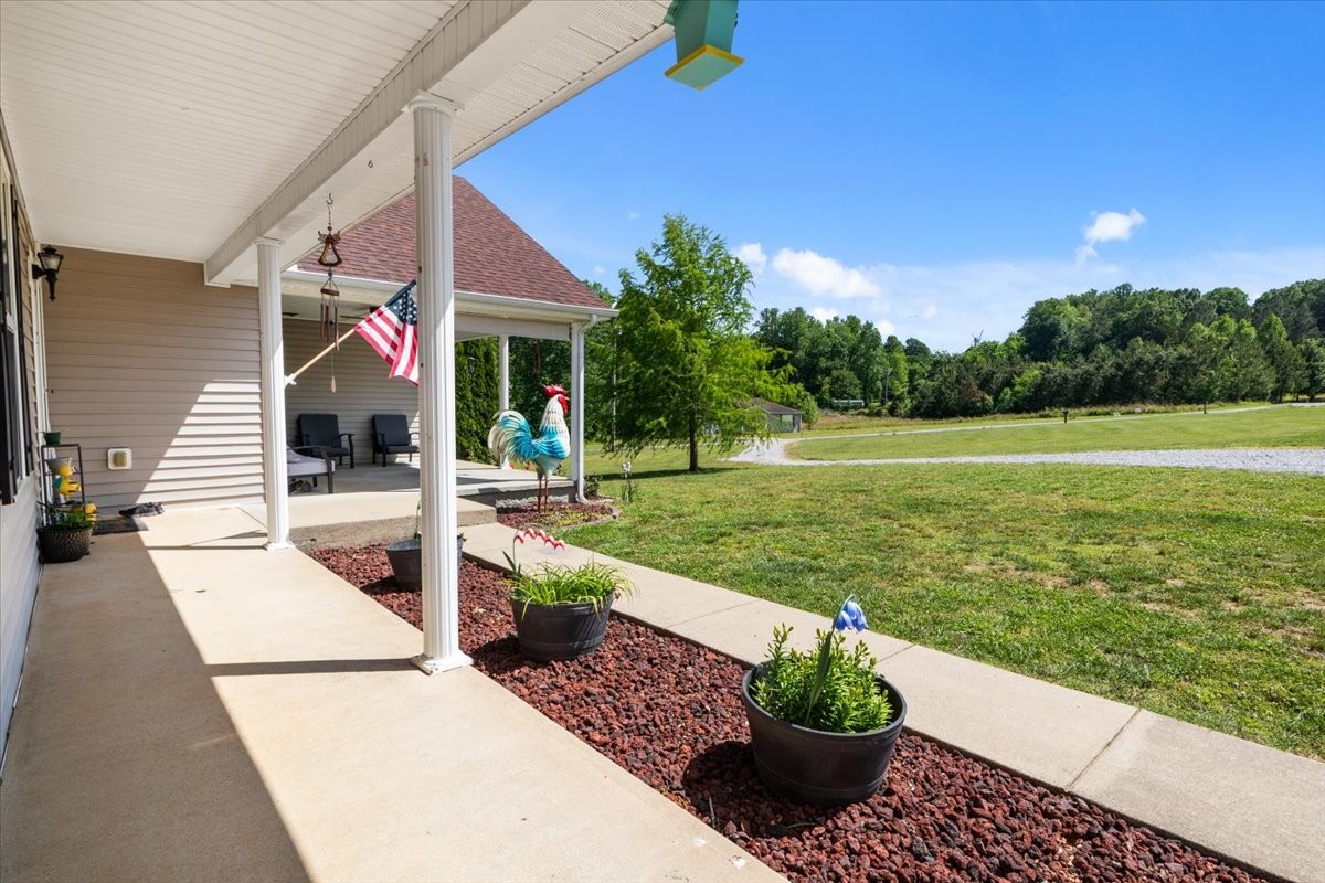 109 Bessie Clark Road Erin, TN 37061 - Photo 3 of 43 a front view of a house with a yard