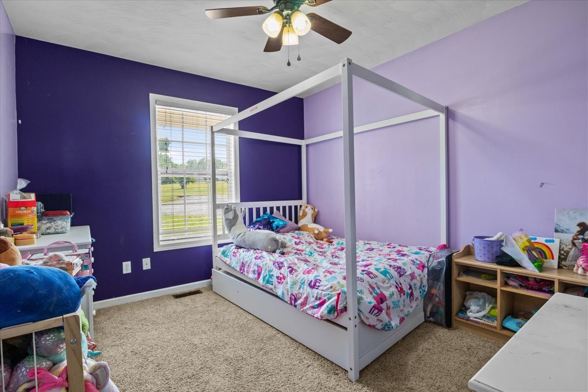 109 Bessie Clark Road Erin, TN 37061 - Photo 31 of 43 a bedroom with bed and a window
