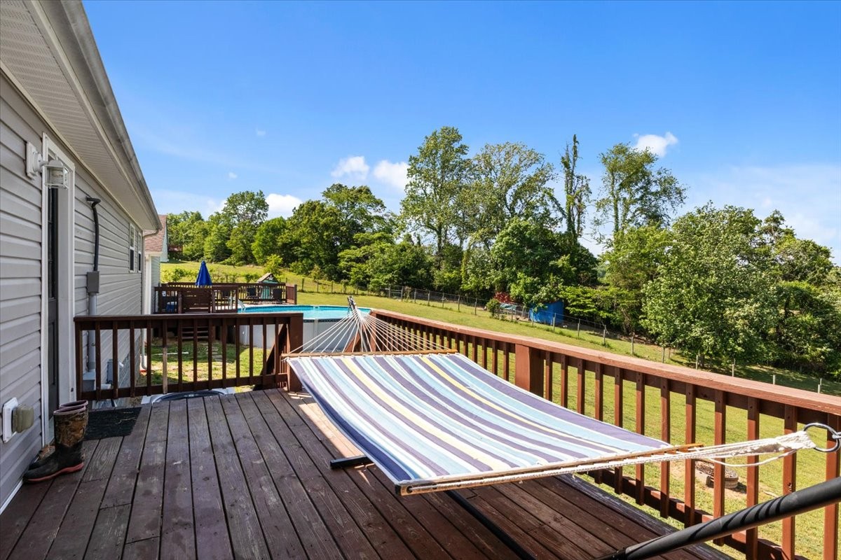 109 Bessie Clark Road Erin, TN 37061 - Photo 39 of 43 a view of balcony with wooden floor and fence