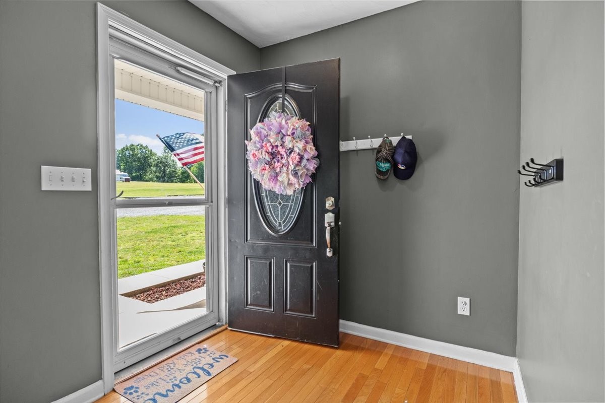 109 Bessie Clark Road Erin, TN 37061 - Photo 7 of 43 a view of a door and wooden floor