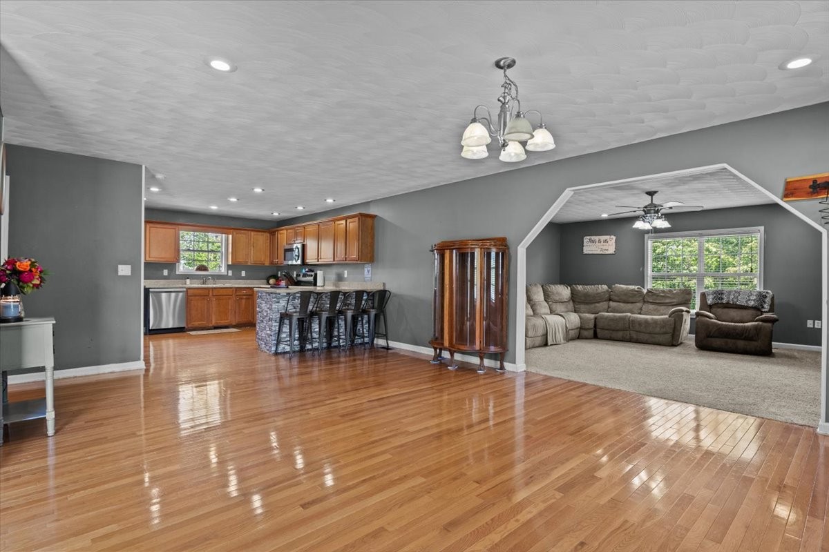 109 Bessie Clark Road Erin, TN 37061 - Photo 9 of 43 a lobby with furniture and a chandelier