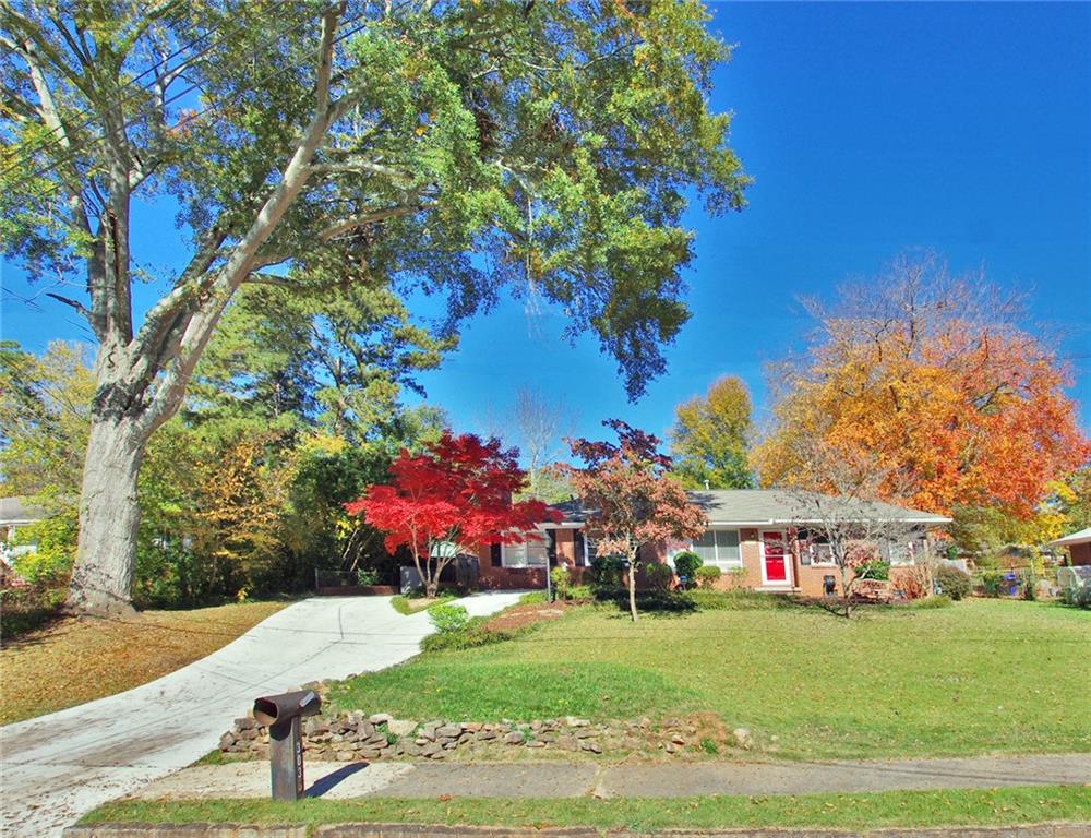 3038 Wilson Road Decatur, GA 30033 - Photo 1 of 1 a front view of a house with a yard
