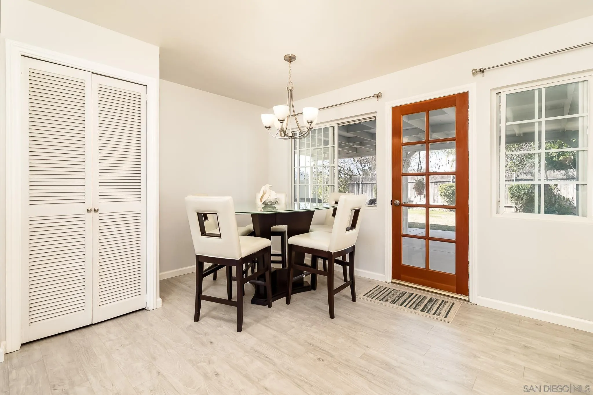 9780 Highdale Road Santee, CA 92071 - Photo 5 of 20 a view of a dining room with furniture window and wooden floor
