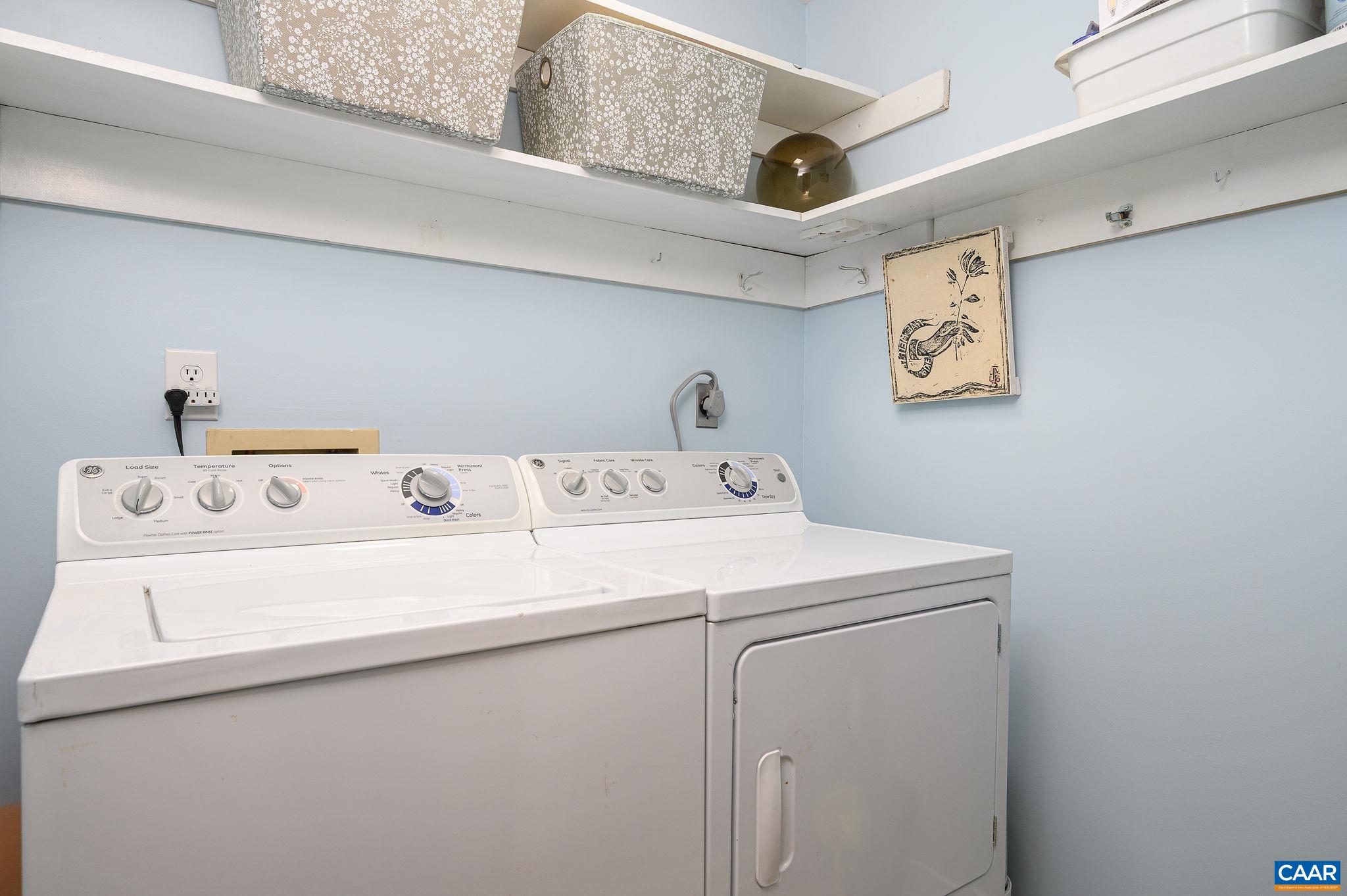 207 2nd Street Northwest, Unit D Charlottesville, VA 22902 - Photo 17 of 18 a utility room with dryer and washer