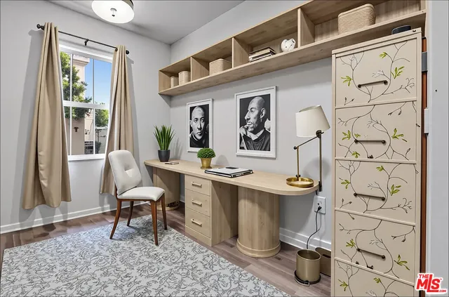 a living room with patio furniture and a window