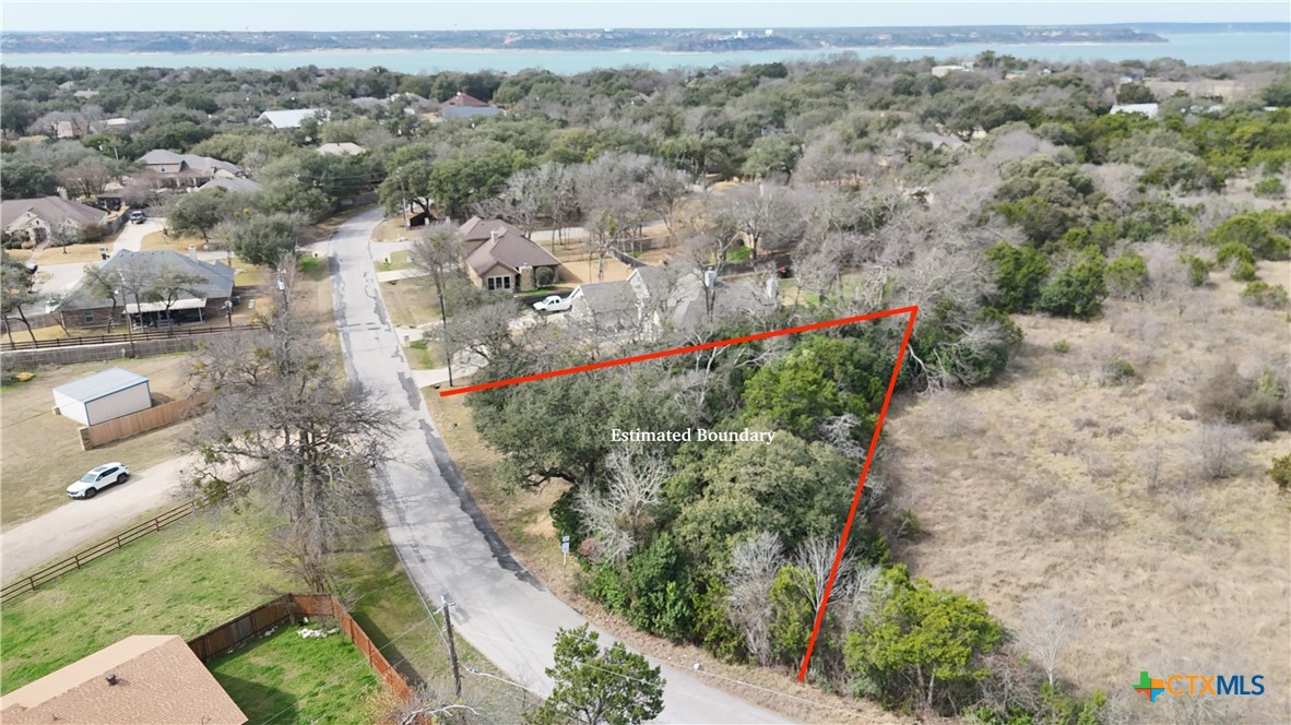 Tbd Arrowhead Point Road Belton, TX 76513 - Photo 7 of 13 an aerial view of residential houses with outdoor space and trees