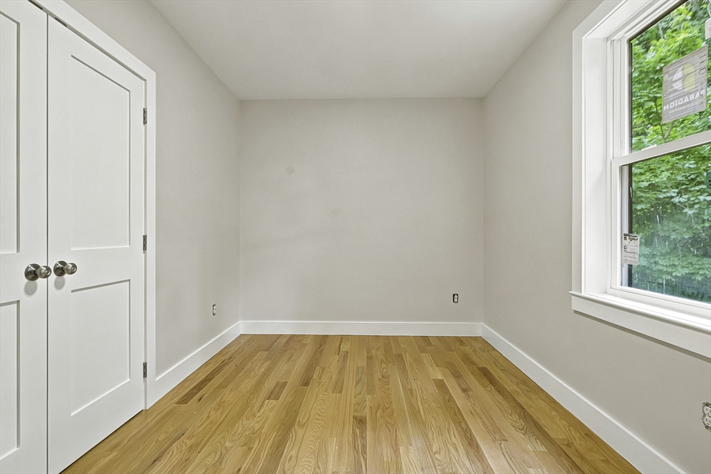4 Mayhew Street Framingham, MA 01702 - Photo 30 of 42 a view of a room with wooden floor and a window