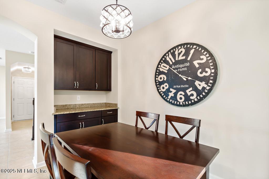 102 San Briso Way St. Augustine, FL 32092 - Photo 15 of 62 a view of a dining room with furniture