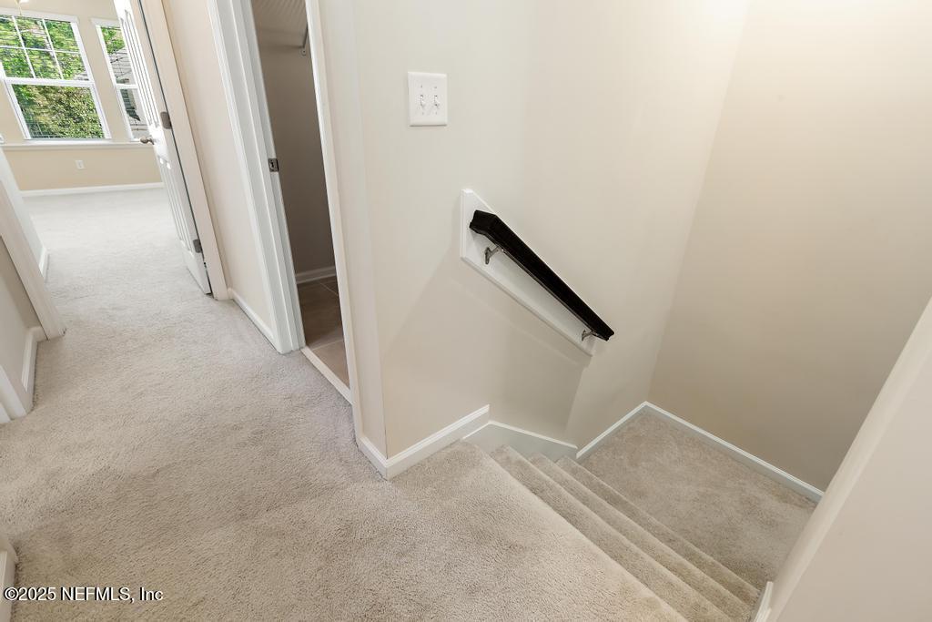 102 San Briso Way St. Augustine, FL 32092 - Photo 30 of 62 a view of a hallway to a house