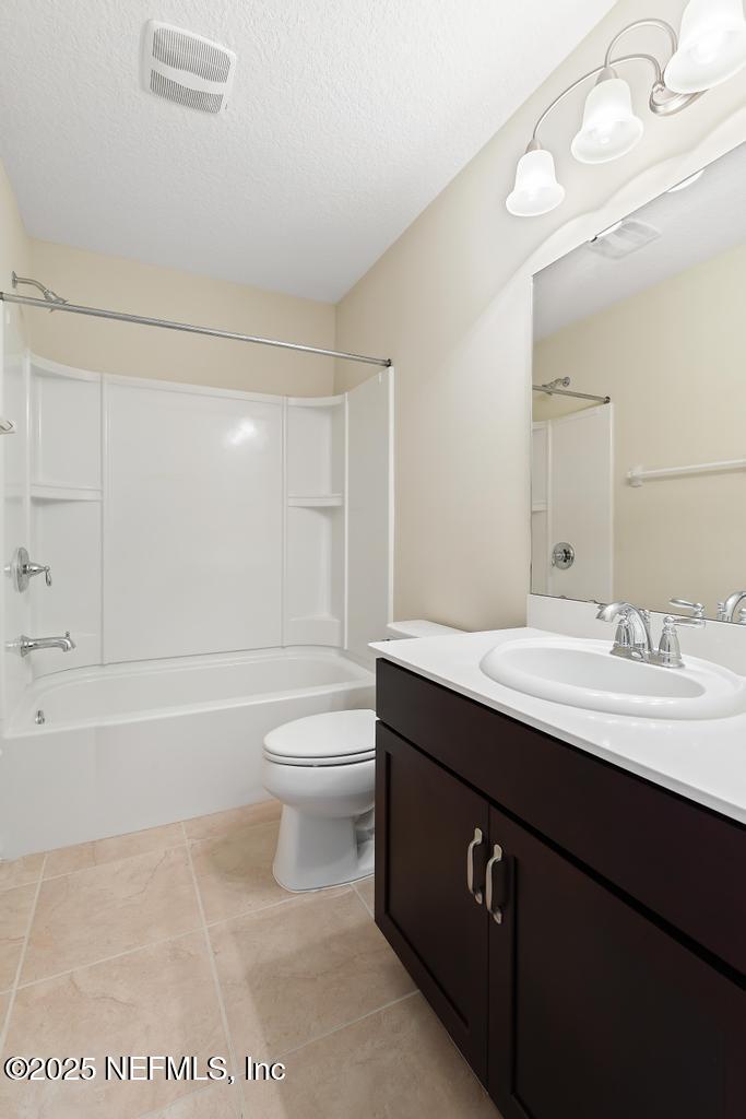 102 San Briso Way St. Augustine, FL 32092 - Photo 36 of 62 a bathroom with a sink a toilet and a bathtub