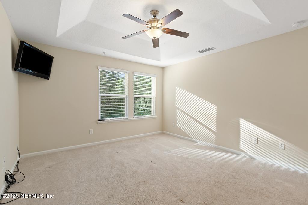102 San Briso Way St. Augustine, FL 32092 - Photo 42 of 62 a view of a livingroom with a flat screen tv