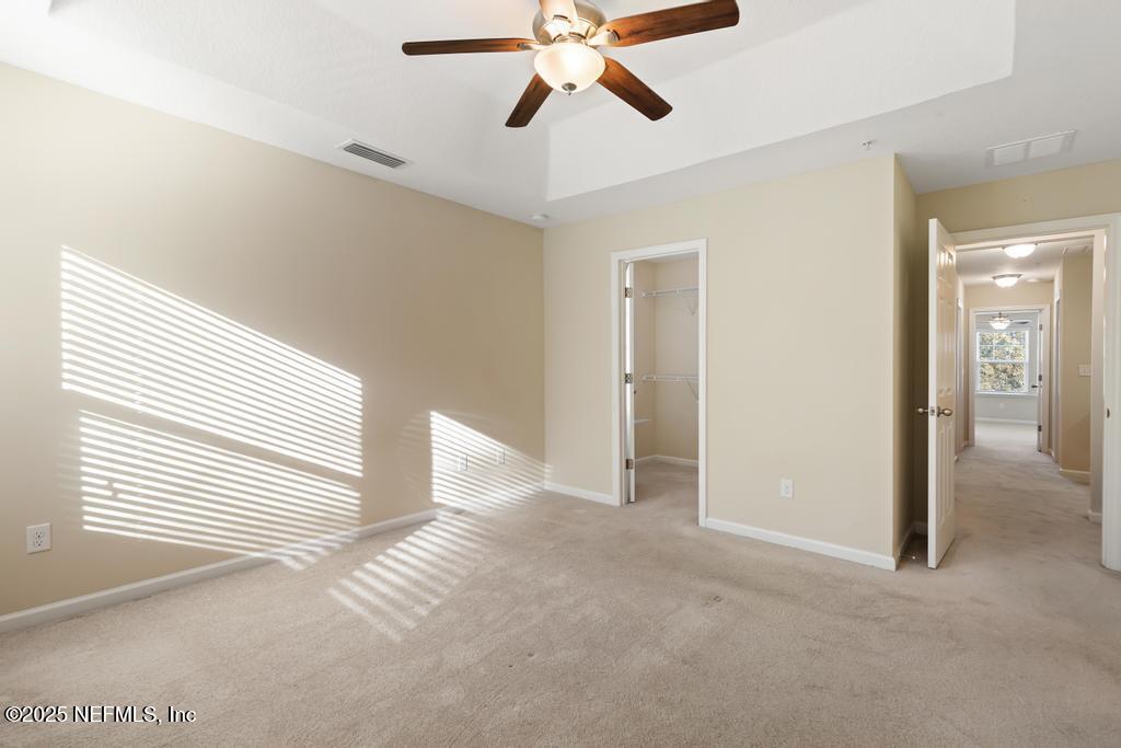 102 San Briso Way St. Augustine, FL 32092 - Photo 43 of 62 a view of entryway and hall with a chandelier fan