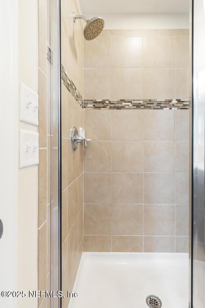 102 San Briso Way St. Augustine, FL 32092 - Photo 50 of 62 a bathroom with a shower