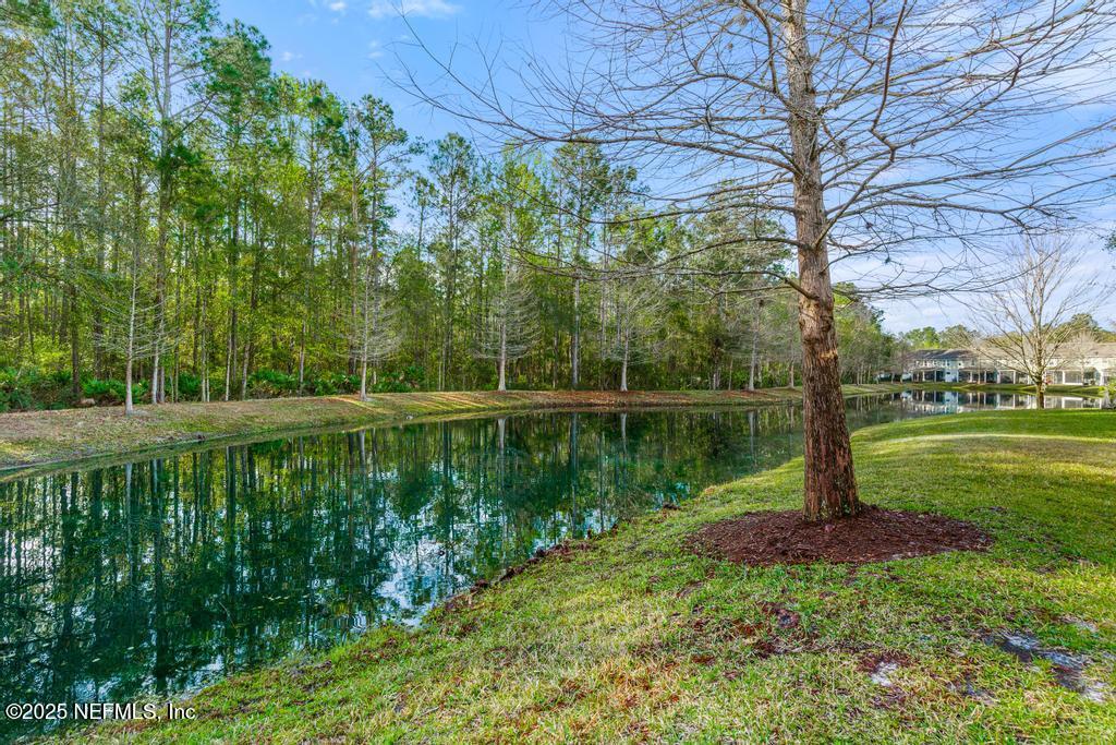 102 San Briso Way St. Augustine, FL 32092 - Photo 57 of 62 a view of lake with a yard