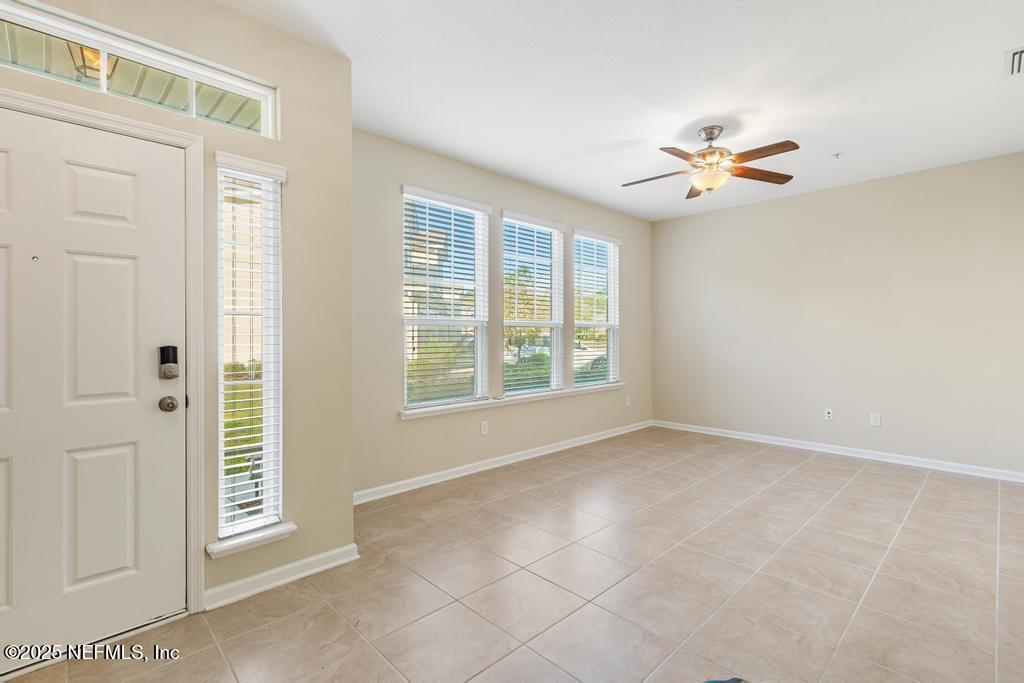 102 San Briso Way St. Augustine, FL 32092 - Photo 9 of 62 a view of an empty room with a window