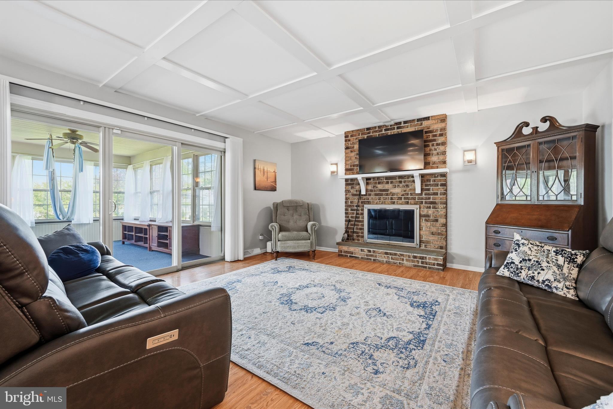 1828 North Eden Road Lancaster, PA 17601 - Photo 12 of 56 a living room with furniture fireplace and flat screen tv