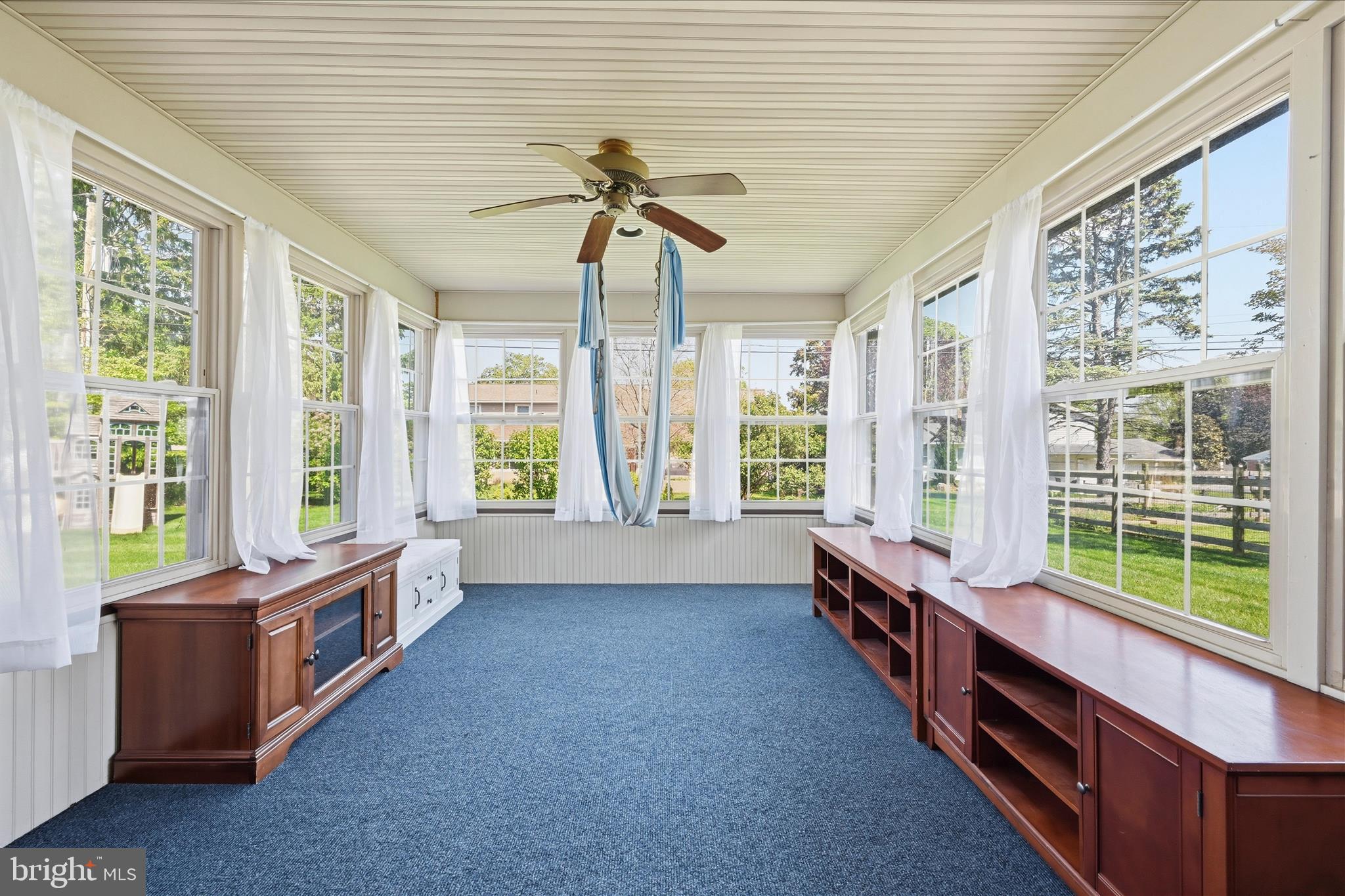 1828 North Eden Road Lancaster, PA 17601 - Photo 23 of 56 a large room with windows and chandelier