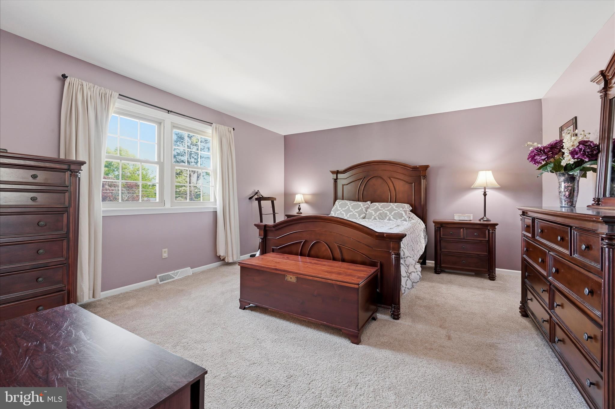 1828 North Eden Road Lancaster, PA 17601 - Photo 27 of 56 a bedroom with a bed and a potted plant