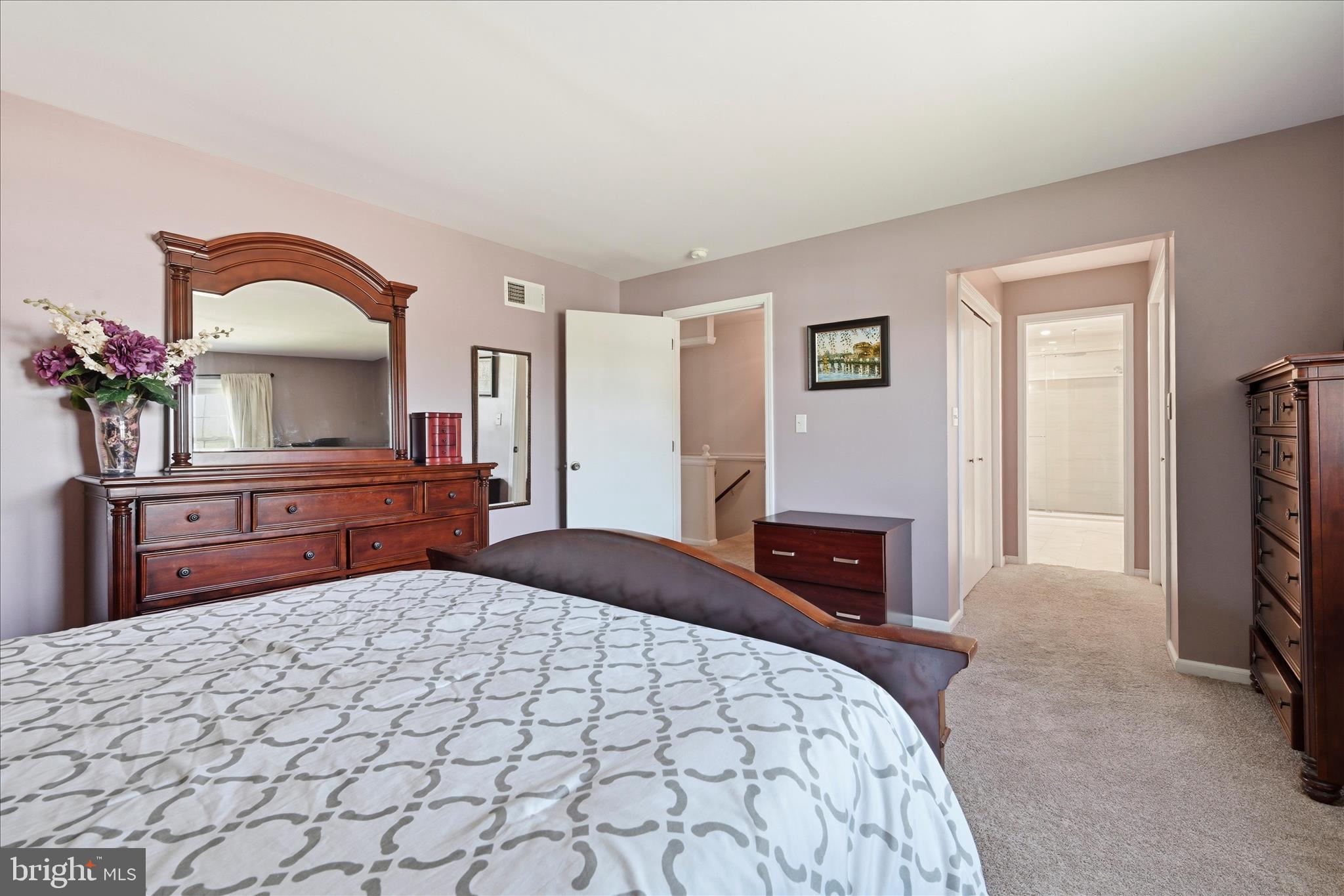 1828 North Eden Road Lancaster, PA 17601 - Photo 28 of 56 a bedroom with a large bed and a dresser