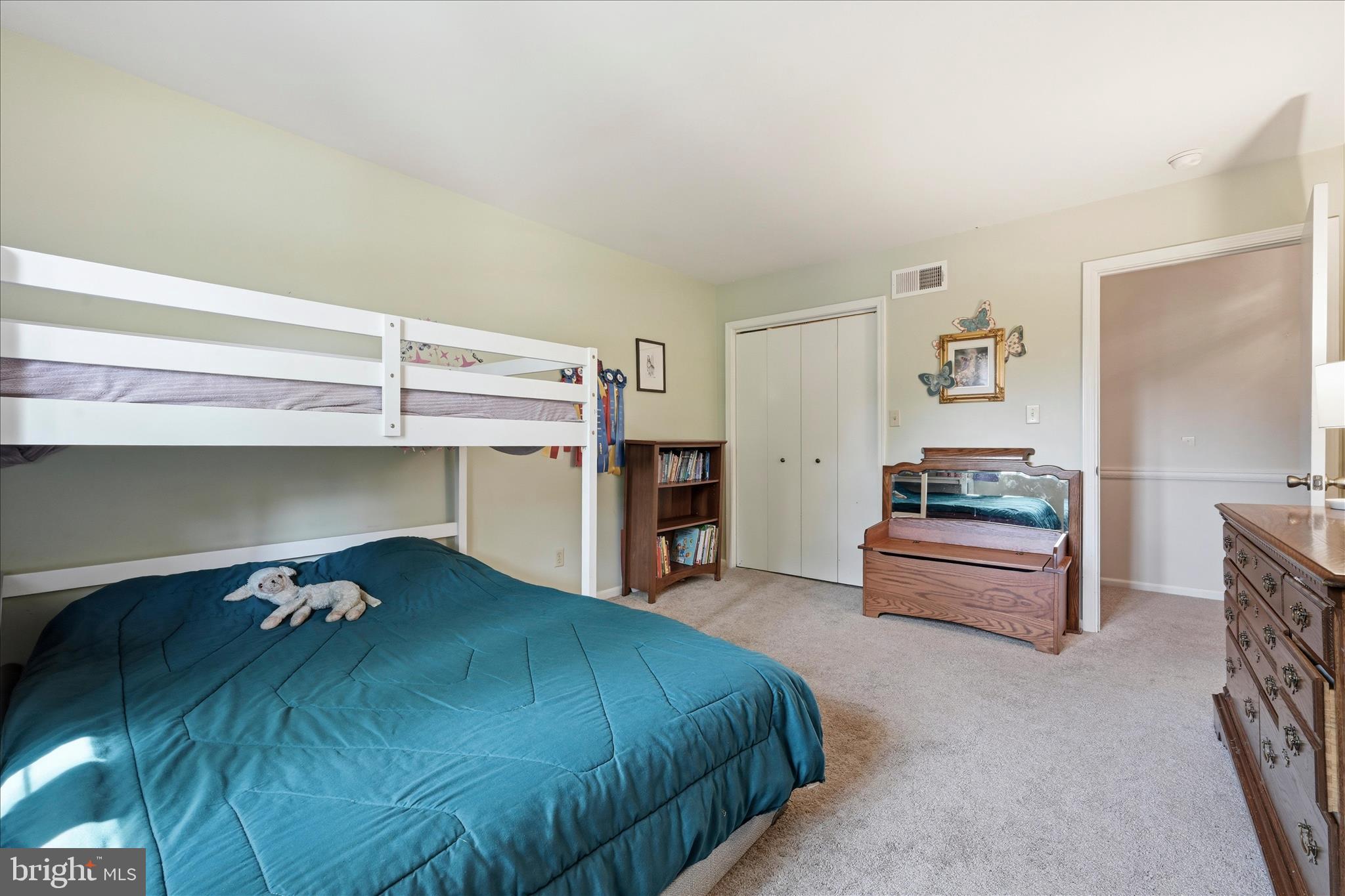 1828 North Eden Road Lancaster, PA 17601 - Photo 36 of 56 a bedroom with a bed and a dresser