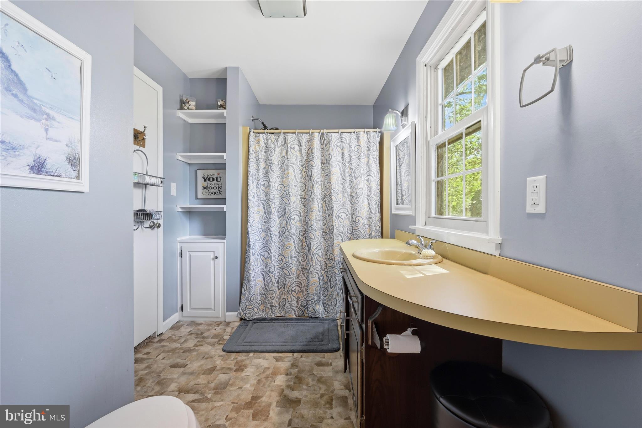 1828 North Eden Road Lancaster, PA 17601 - Photo 38 of 56 a bathroom with a sink and a mirror
