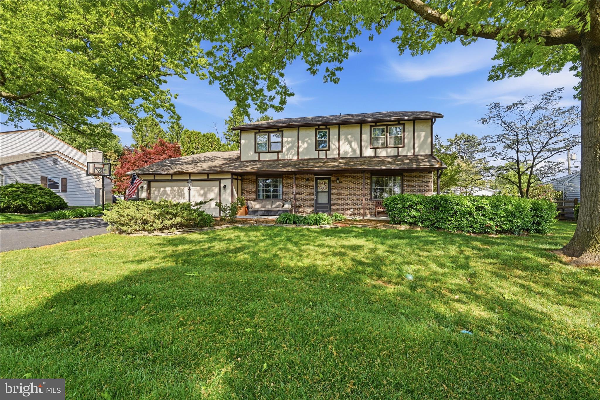 1828 North Eden Road Lancaster, PA 17601 - Photo 5 of 56 a view of a house with a yard and potted plants