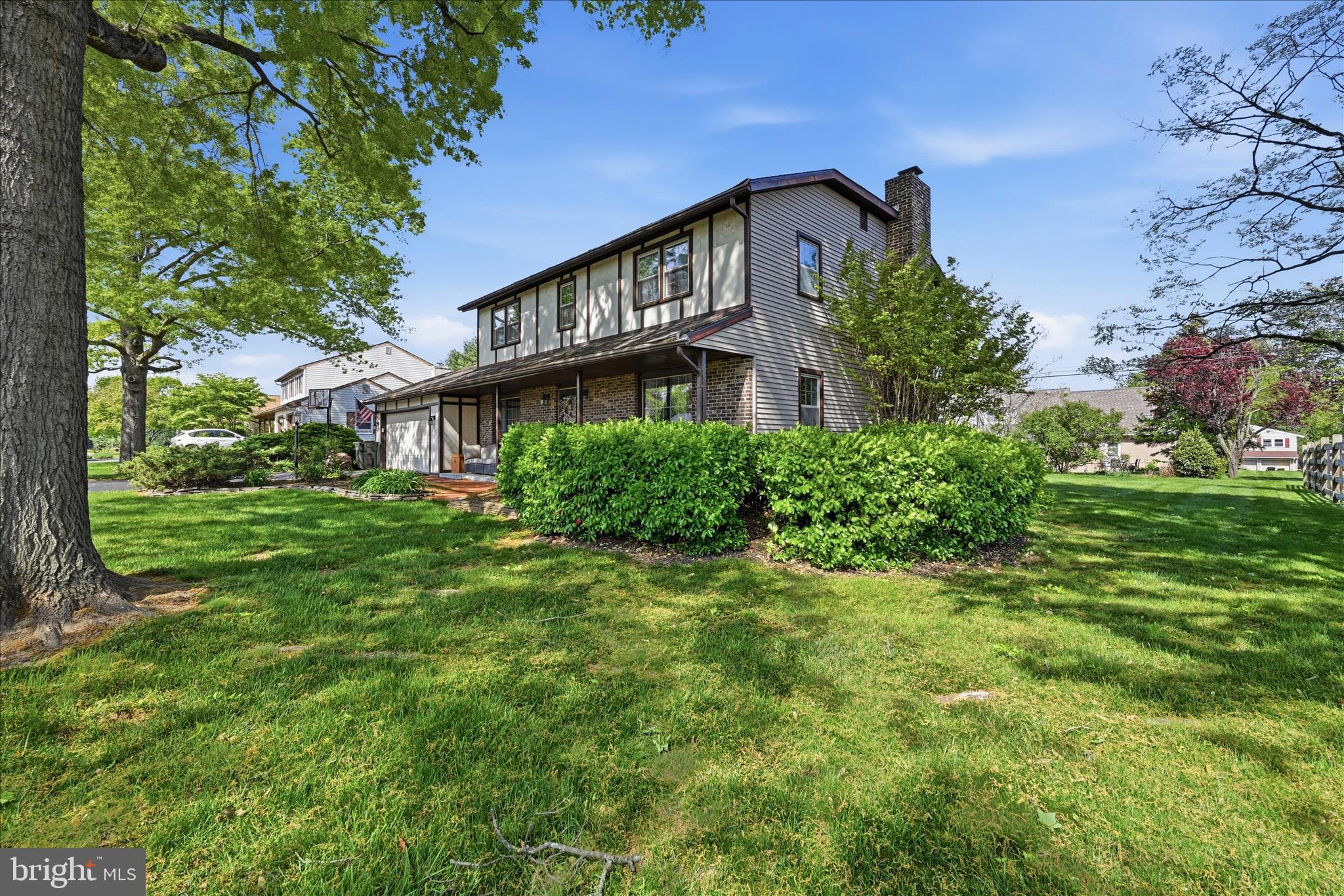 1828 North Eden Road Lancaster, PA 17601 - Photo 6 of 56 a front view of a house with a yard