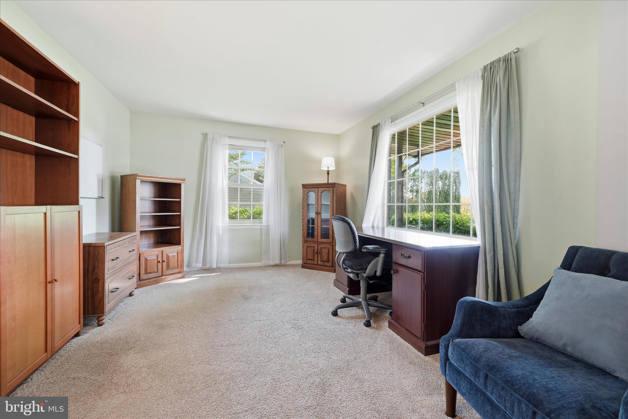 1828 North Eden Road Lancaster, PA 17601 - Photo 10 of 56 a view of a livingroom with workspace and a couch
