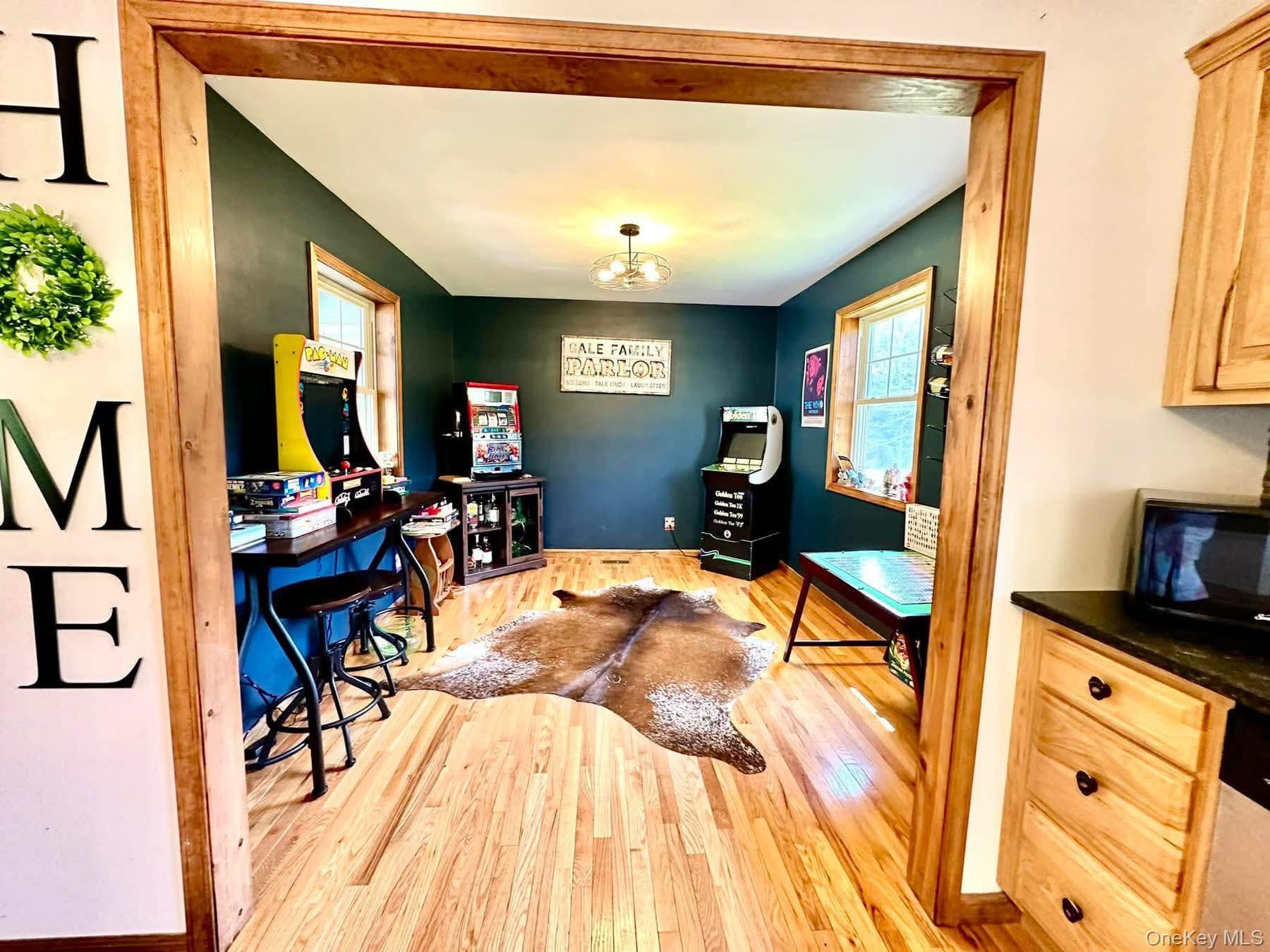 595 Hurd And Parks Road Swan Lake, NY 12783 - Photo 24 of 43 Home office with wood finished floors and baseboards