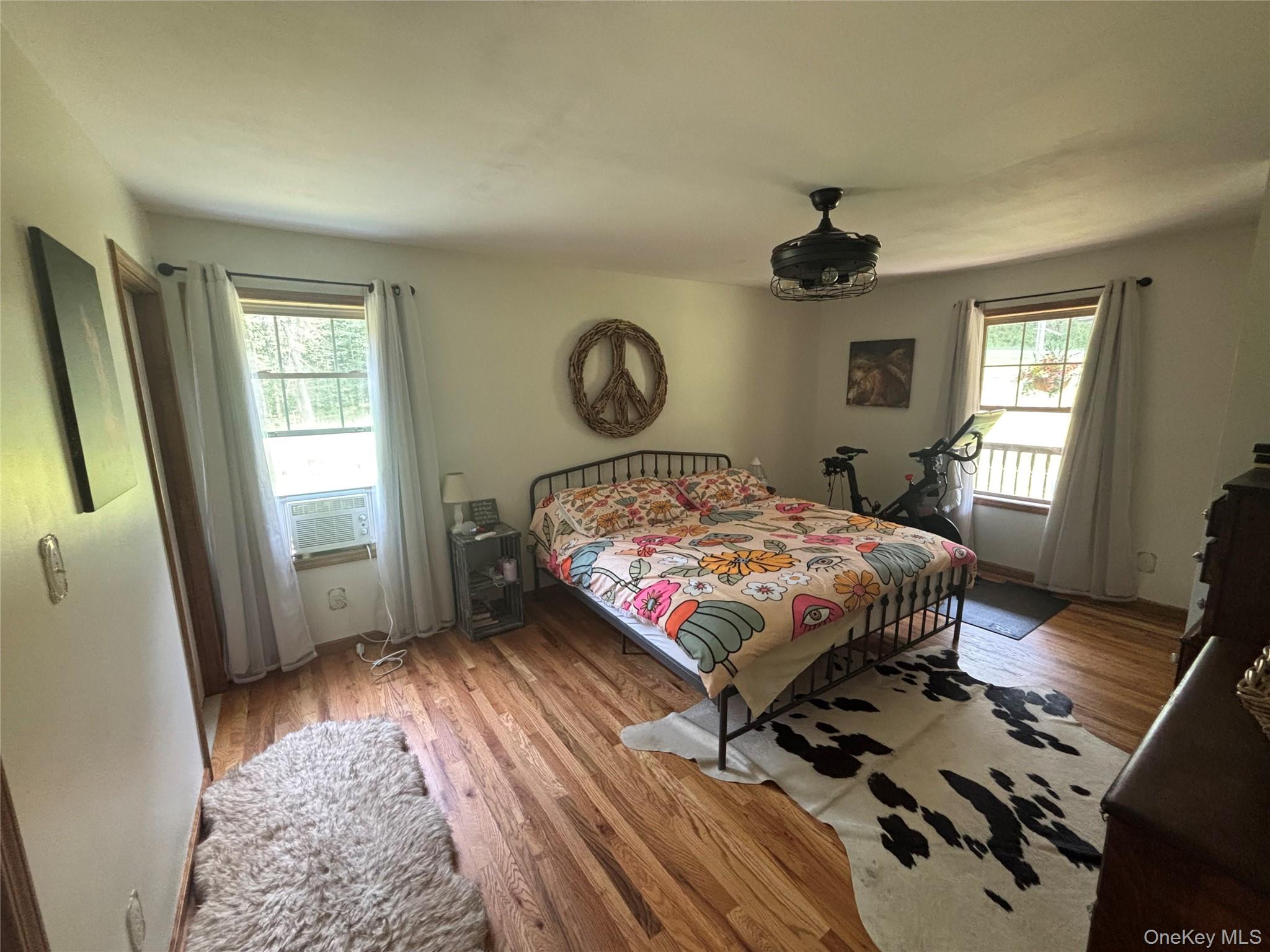 595 Hurd And Parks Road Swan Lake, NY 12783 - Photo 30 of 43 Bedroom with wood finished floors