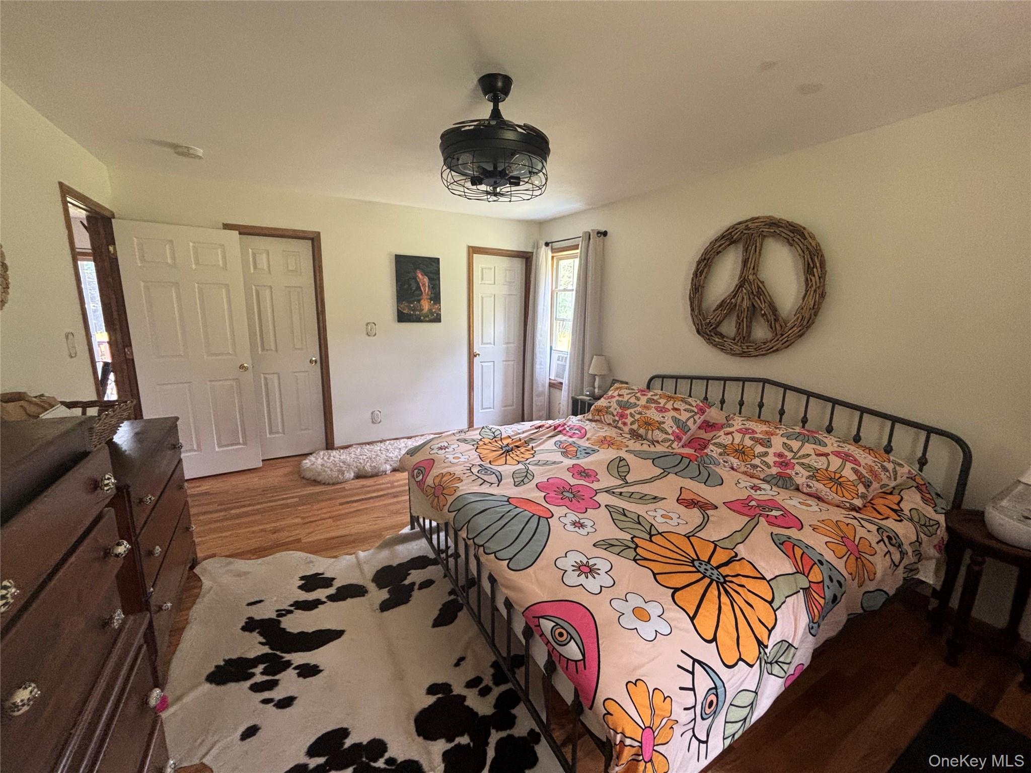 595 Hurd And Parks Road Swan Lake, NY 12783 - Photo 31 of 43 Bedroom featuring wood finished floors