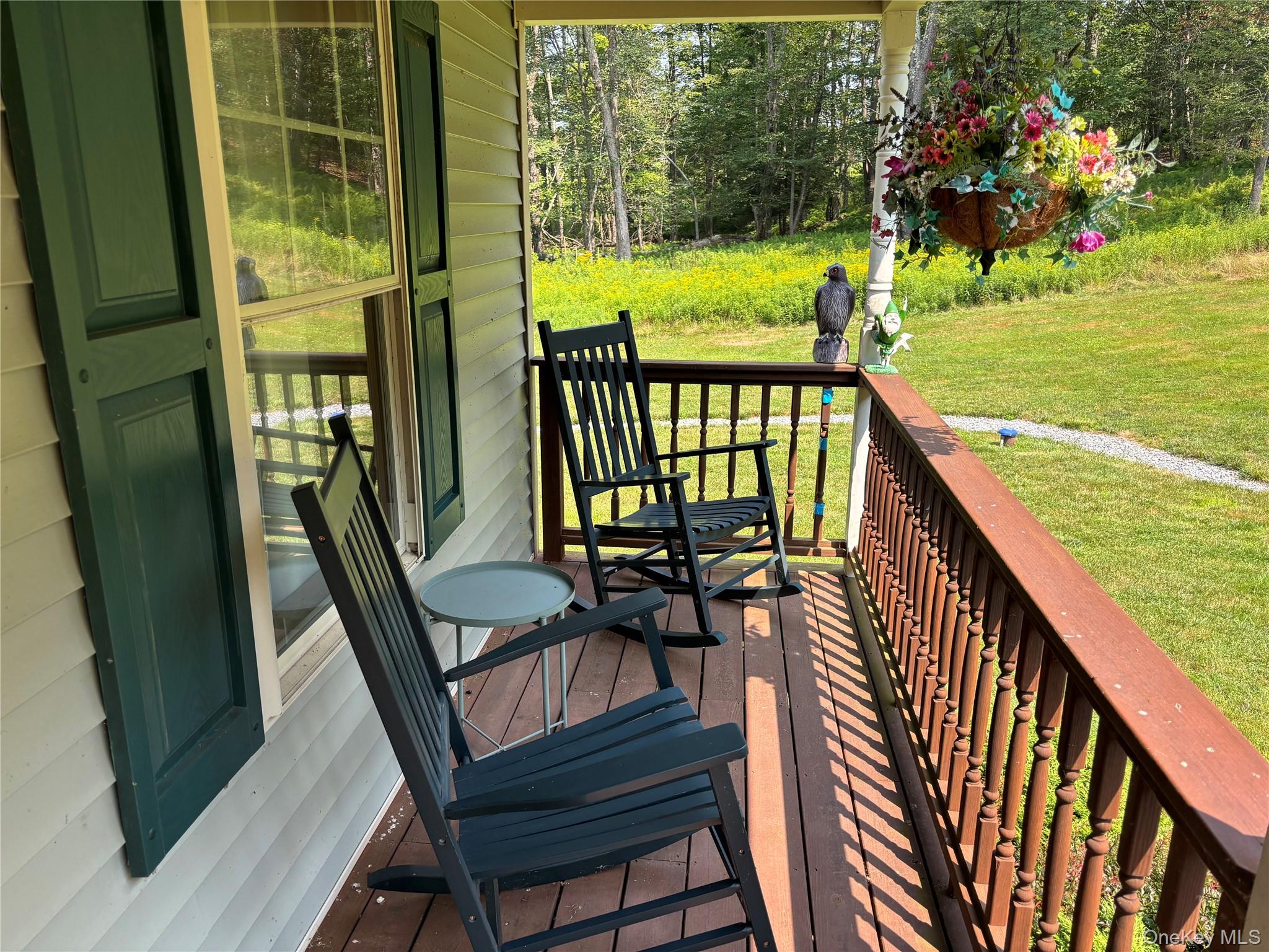 595 Hurd And Parks Road Swan Lake, NY 12783 - Photo 41 of 43 Deck featuring a lawn