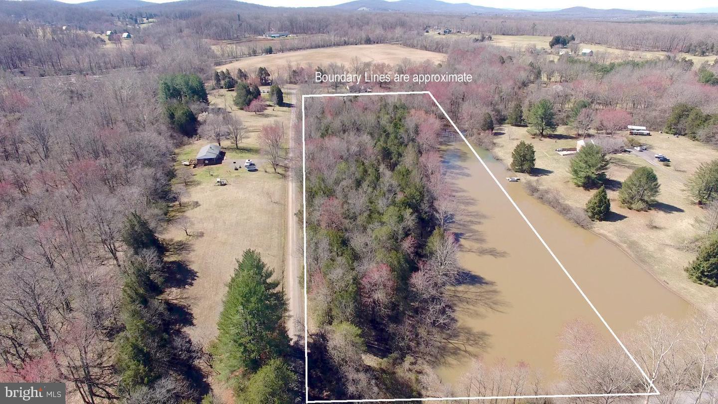 0 McAlexander Road Orange, VA 22960 - Photo 14 of 15 an aerial view of a house with a yard and mountain view