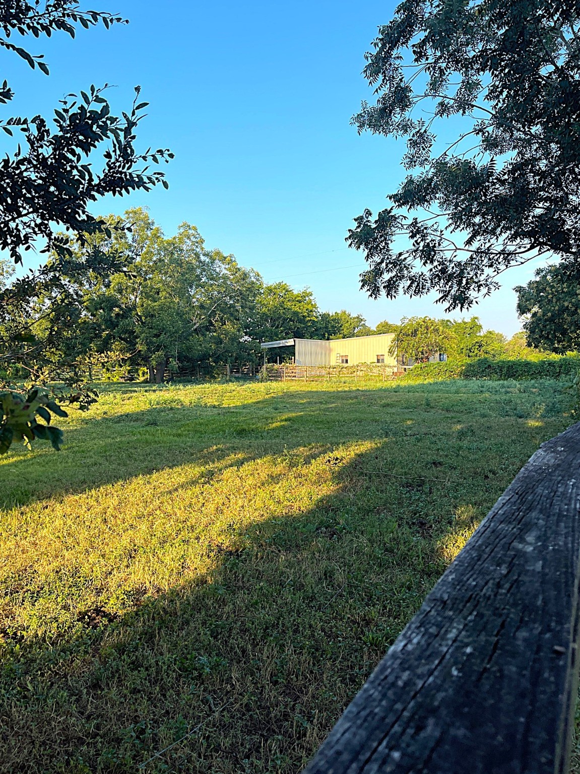 0 Hackamore Road Wallis, TX 77485 - Photo 10 of 12 a view of a lake with a big yard