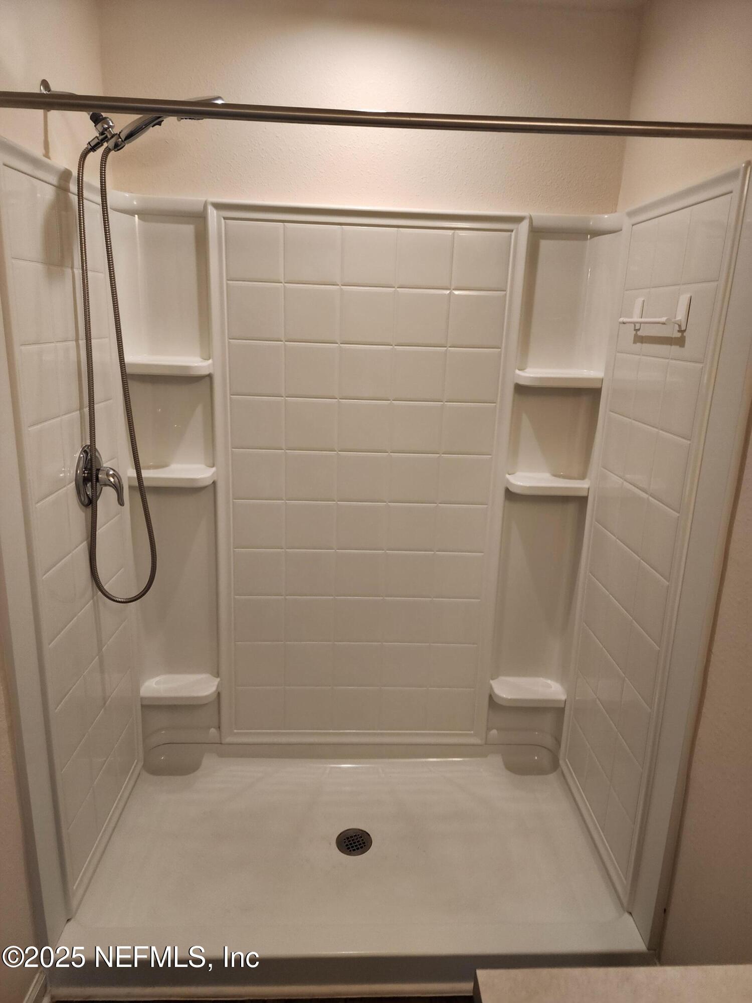 2295 Falling Star Ln Green Cove Springs Green Cove Springs, FL 32043 - Photo 20 of 24 a bathroom with a shower