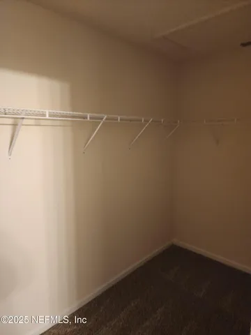 a view of small space with racks on the wall