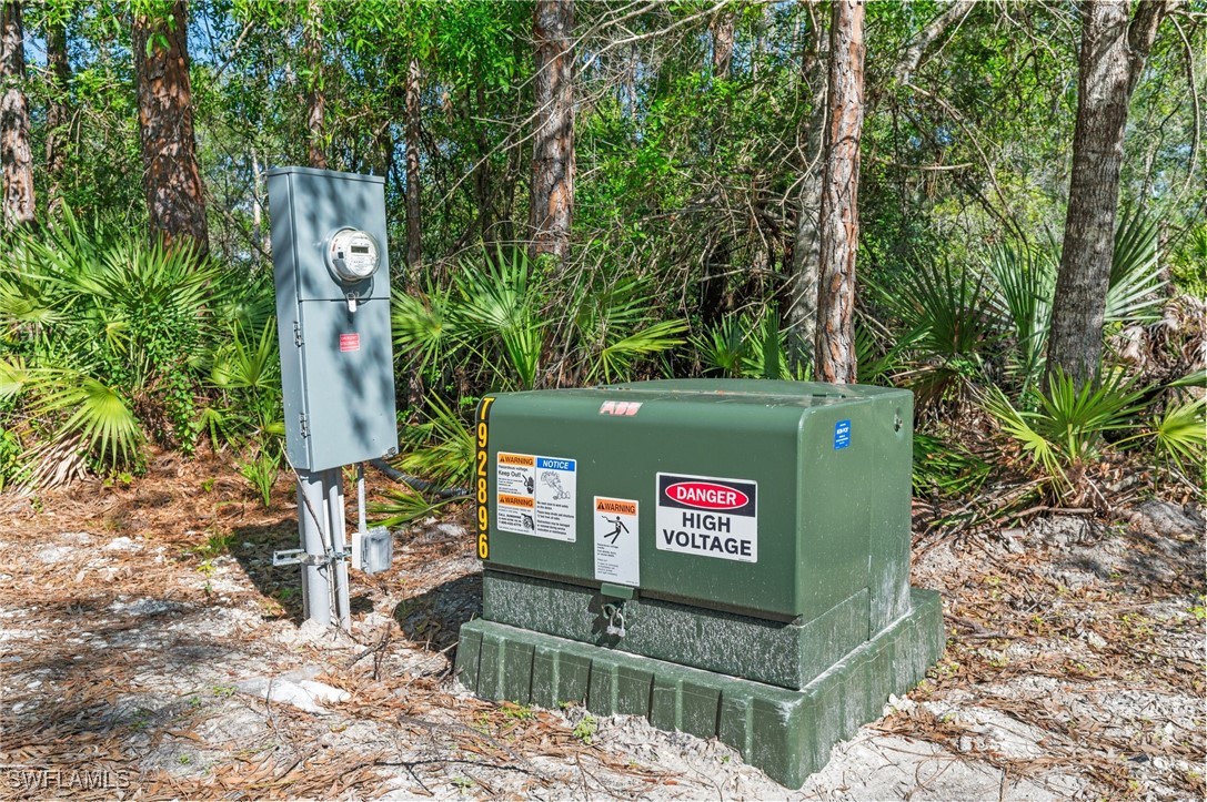 15841 Rasmussen Road Punta Gorda, FL 33982 - Photo 16 of 25 a sign on the side of the road