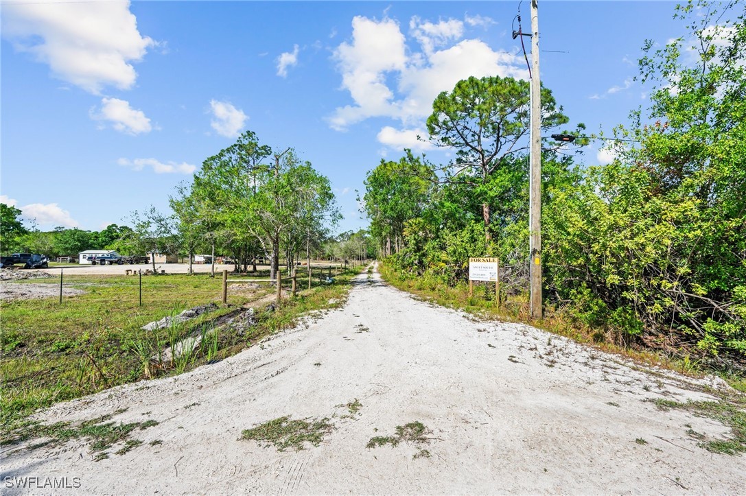 15841 Rasmussen Road Punta Gorda, FL 33982 - Photo 5 of 25 a view of a lake with a big yard