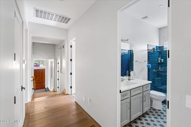 a view of bathroom with washer and dryer