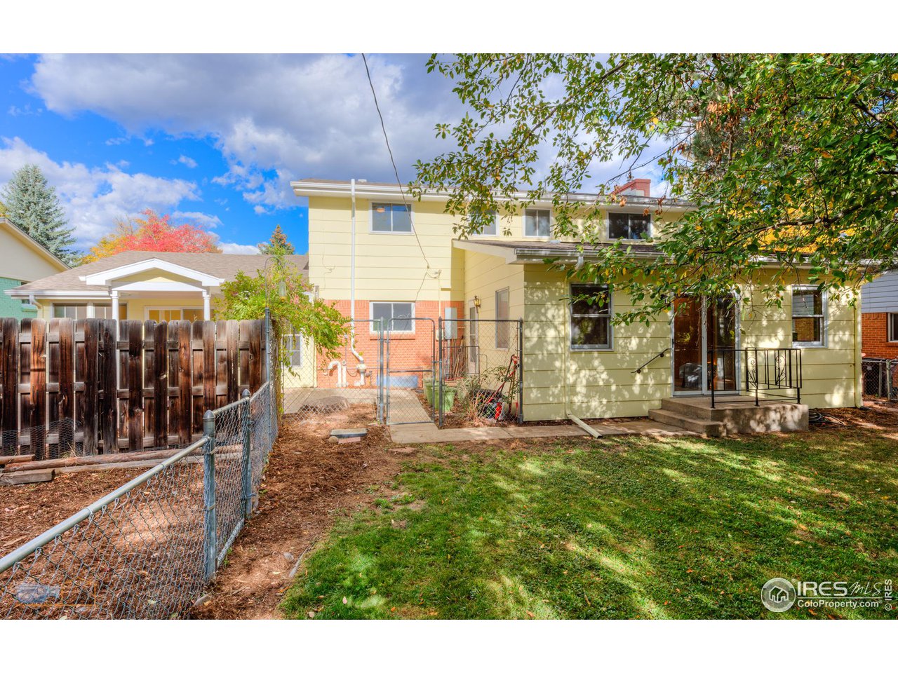1050 Berea Drive Boulder, CO 80305 - Photo 15 of 40 a view of a house with a backyard